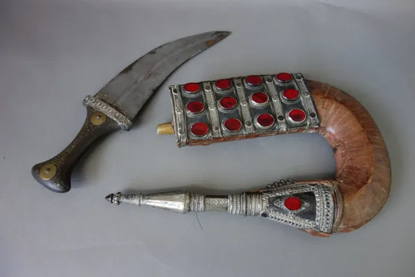 Two Middle Eastern jambia, two Burmese shan knives, and a small ivory bound Sumatran kris, 24cm long, (5).