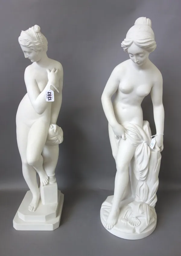 A modern reconstituted marble figure, modelled as a female on a naturalistic circular base, indistinctly signed, 66cm high, and another similar figure