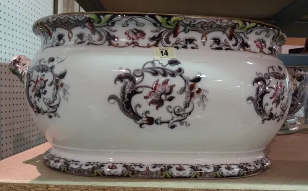 A Wedgwood earthenware two-handled oval foot bath, circa 1830, printed and coloured with flowers (a.f), impressed mark, 56cm wide across handles; and