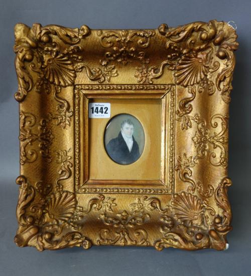 Victorian School, a pair of reverse painted on glass silhouette portrait miniatures of Thomas and Sarah Thorne, in ebonised moulded oval frames, 13cm