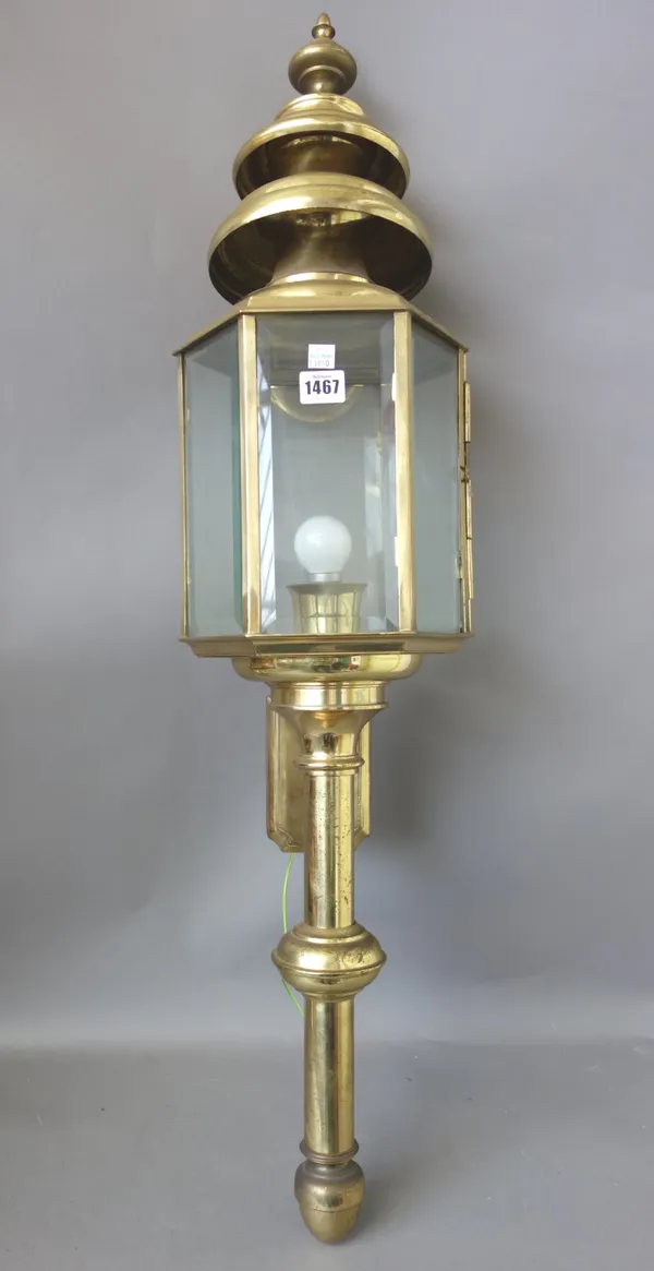 A large Victorian style gilt metal coaching lamp, modern, of hexagonal form, with inset bevelled glass panels, 100cm, and another similar smaller coac