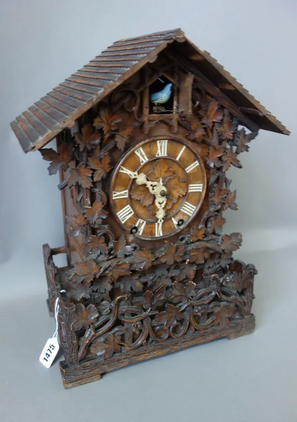 A Black Forest cuckoo clock, late 19th century, of typical form, with a two train movement, paper label to interior Camerer, Kuss & Co. (a.f), 40cm hi