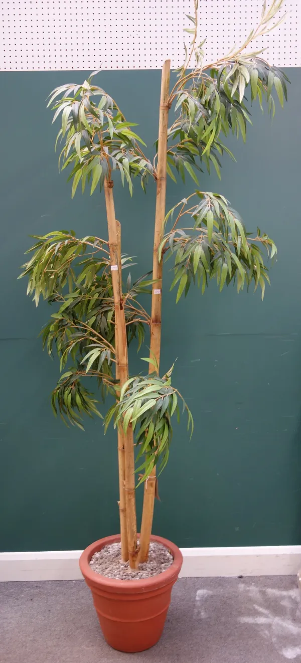 Three faux bamboo plants, each with leafy foliage and pot, the tallest 240cm high, (3).
