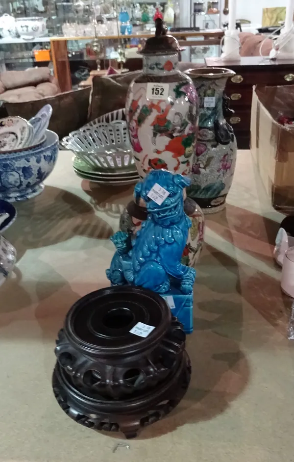 Asian ceramics, including; a crackle glazed vase with dragon moulded decoration, a crackle glazed ginger jar, a vase and cover, and two turquoise dogs