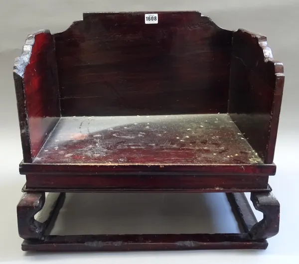 An early 20th century Chinese cat bed, with three quarter shaped sides, on shaped supports, 51cm wide x 46cm high x 38cm deep.