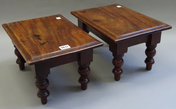 A pair of 19th century mahogany rectangular table stands, on turned supports, 36cm wide x 20cm high x 25cm deep.
