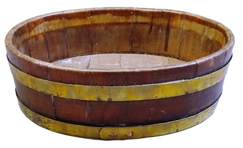 A late 19th century coopered oak and brass oval jardiniere, 41cm wide x 13cm high x 32cm deep and a pine and beech miniature dressers and rack in the