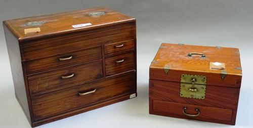 A 19th century Eastern softwood table cabinet, the lift top over five various drawers, 32cm wide x 25cm high x 21cm deep, together with a square lift