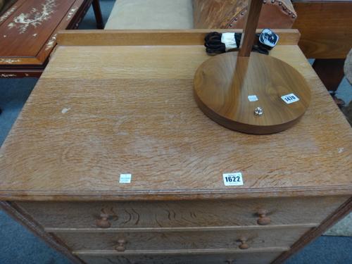 Heals,101 Tottenham Court Road, London, a limed oak chest of three long graduated drawers, on bun feet, 59cm wide x 81cm high x 46cm deep.  Illustrate