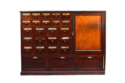 A Victorian mahogany apothecary cabinet, with twenty-five various drawers and cupboard, on plinth base, 162cm wide x 122cm high x 31cm deep.  Illustra