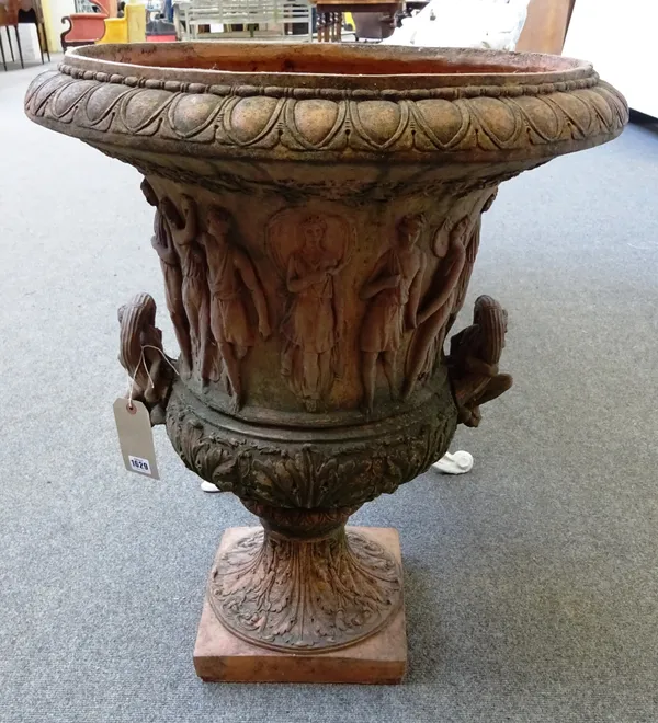 A pair of terracotta garden urns, each deep relief moulded with classical figures on acanthus socle, 60cm diameter x 75cm high.