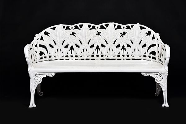 A pair of white painted aluminium garden benches in the Lily of The Valley (Convolaria) pattern after a design by Coalbrookdale, each 155cm wide x 85c