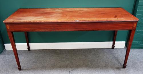 A George III inlaid mahogany serving table, the rectangular top on four tapering square supports, 182cm wide x 86cm high x 69cm deep.