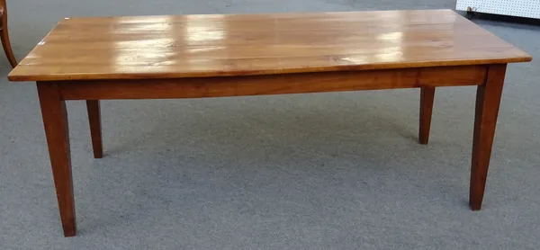 A 19th century French cherry wood extending dining table, the plank top on tapering square supports, 85cm wide x 200cm long x 256cm extended x 76cm hi