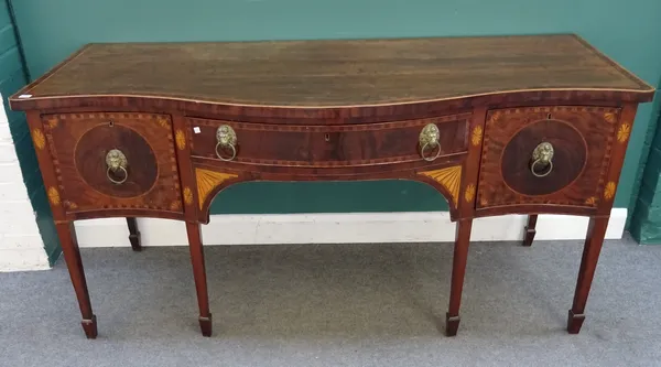A George III mahogany, box strung, fan and spray marquetry inlaid serpentine front sideboard, with single drawer, flanked by deep drawers, square tape