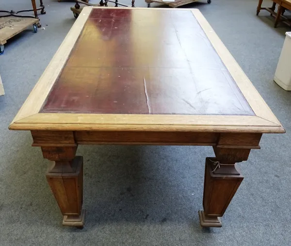 A Victorian oak centre table, the rectangular leather inset top on four tapering square supports, 106cm wide x 215cm long x 77cm high.