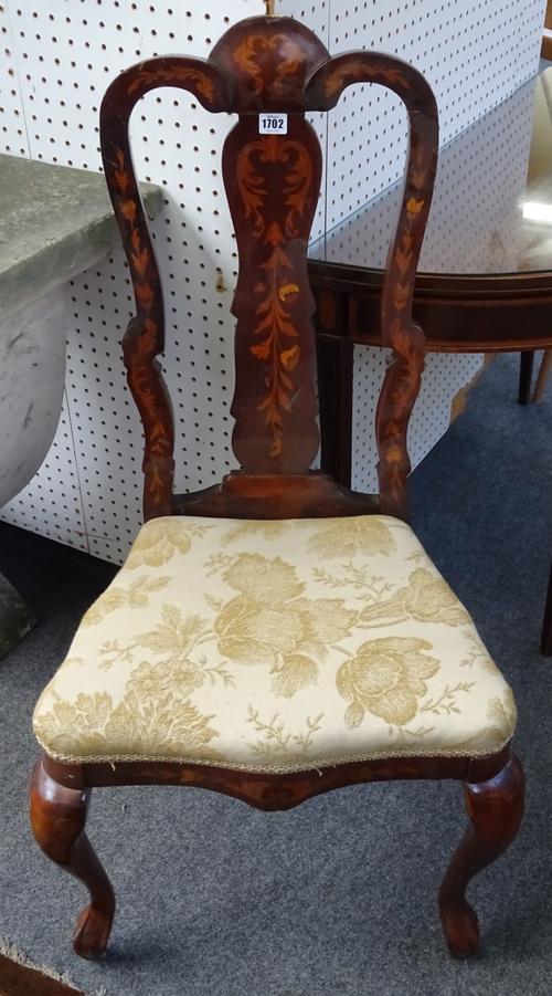 A pair of 17th century Dutch style marquetry inlaid walnut vase back side chairs with serpentine seat and scroll supports, 58cm wide x 04cm high.