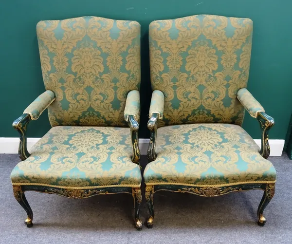 A pair of George III style green painted parcel gilt open armchairs, with serpentine seat and scroll supports, 72cm wide x 107cm high.