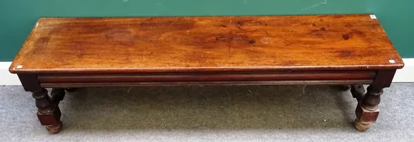 A Victorian mahogany bench, the rectangular top over moulded frieze, on block and turned supports united by stretchers, 163cm wide x 41cm high x 42cm