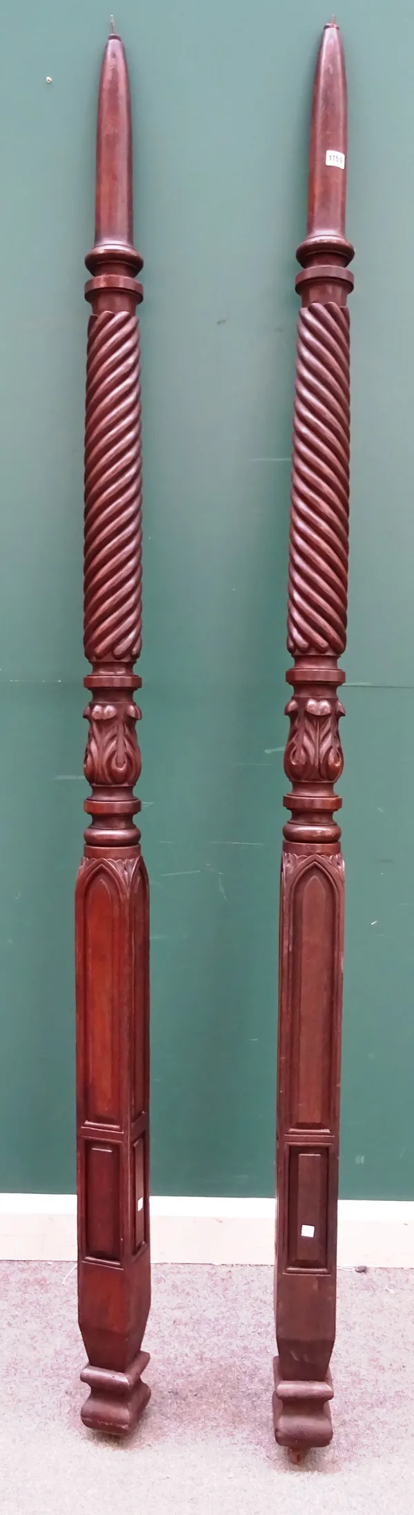 A pair of 19th century mahogany bed posts, each with spiral turned and stiff leaf carved columns, 228.5cm high, (2).