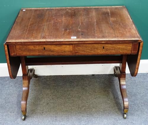 A Regency pollard oak banded rosewood sofa table, with a pair of frieze drawers on four downswept supports, 89cm wide across x 154cm across open x 69c