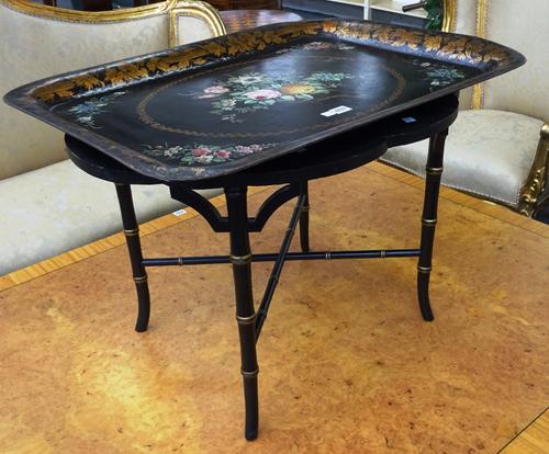 A Victorian tole piente rectangular tray, on later ebonised and parcel gilt faux bamboo stand, 77cm wide x 50cm high x 56cm deep.