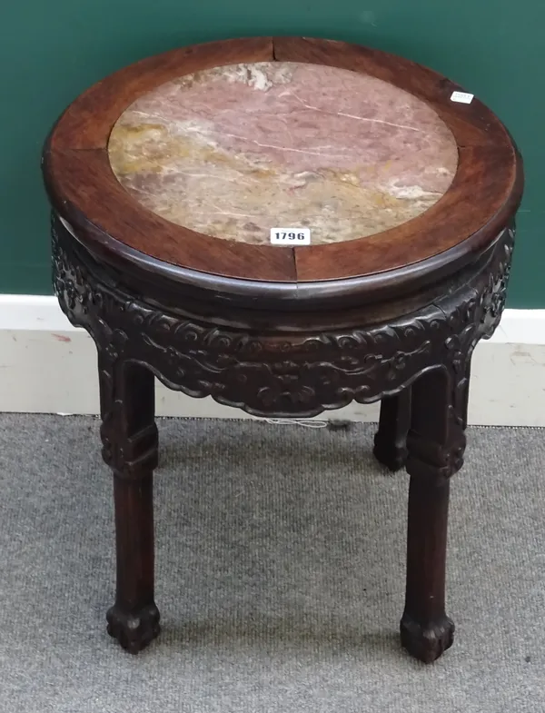 A 19th century Chinese carved hardwood urn stand, with inset circular marble top on four stepped supports, 42cm diam. x 47m high.