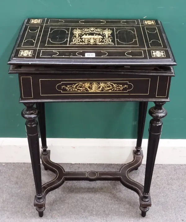 A late 19th century Milanese ebonised and ivory inlaid foldover card table, the rectangular top with gaming inlay, scroll inlaid frieze and fluted tap