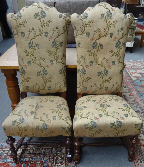 A set of eleven Continental 17th century style dining chairs, with shaped high back on turned and stained beech supports (11),