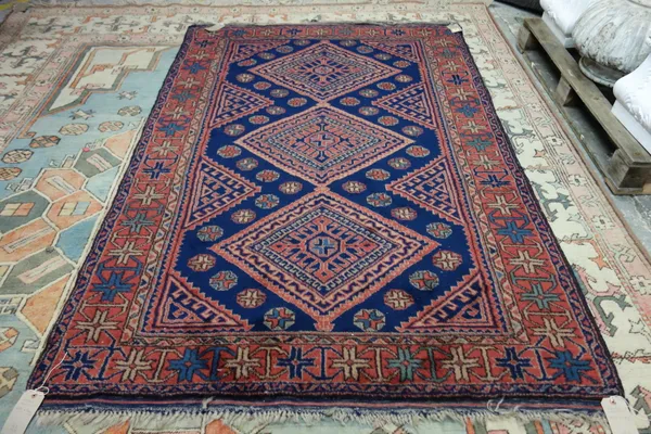 A blue and pink Spartan rug.
