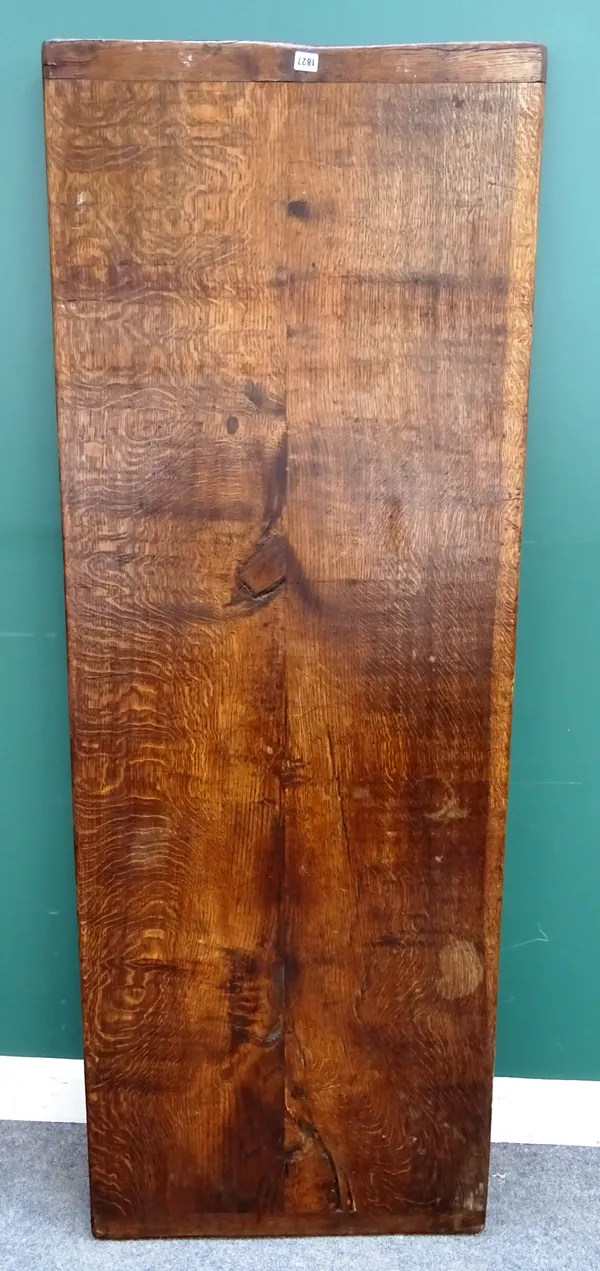 An oak double plank refectory table top, probably 18th century, with cleated ends, 71cm wide x 194cm long x 3.5cm thick.