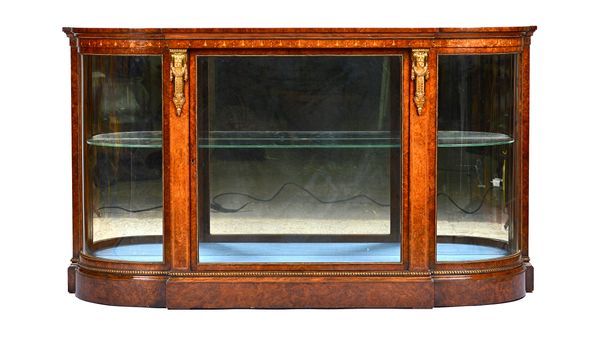 A late Victorian gilt metal mounted marquetry inlaid figured walnut display cabinet, with central door flanked by rounded sides 157cm wide x 90cm high