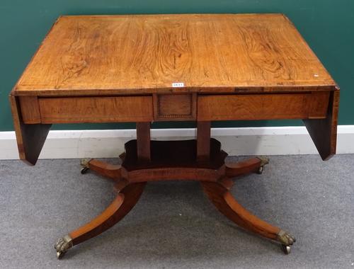 A Regency rosewood sofa table, with a pair of flush fit frieze drawers on four downswept supports, 92cm across x 150cm across open x 69cm deep x 70cm