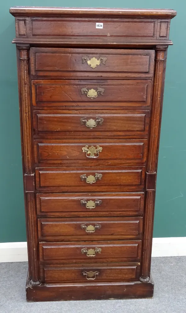 A late 19th century walnut nine drawer collector's cabinet, with flanking split fluted columns, 74cm wide x 160cm high x 42cm deep.