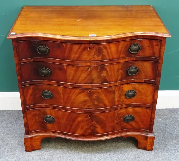 A small George III style mahogany serpentine chest of four long graduated drawers, on bracket feet, late 19th century, 80cm wide x 77cm high x 49cm de