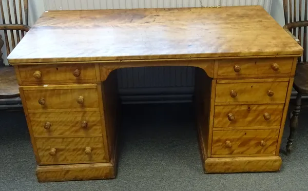 Holland & Sons; a late Victorian satinwood twin pedestal desk,  the rectangular top above two frieze drawers, four drawers to one pedestal and cupboar