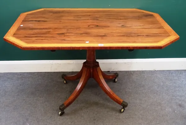 A late George III breakfast table, the satinwood banded rosewood canted rectangular snap top on four downswept supports, 130cm wide x 95cm deep x 75cm