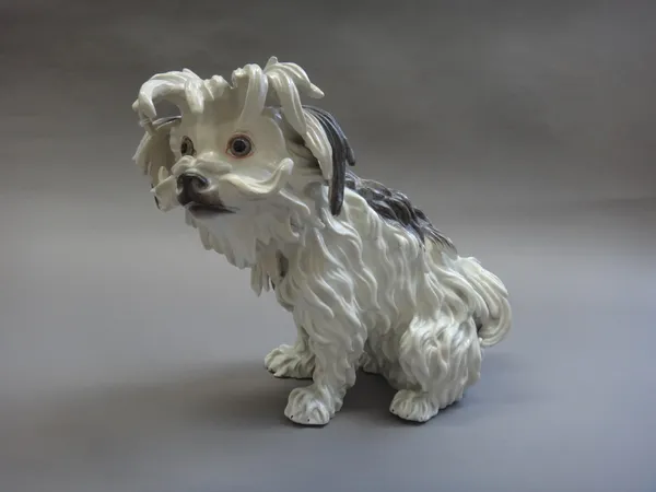 A Samson porcelain model of a Bolognese hound, 19th century, blue painted mark, restored, 21.5cm high.