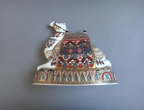 A Royal Crown Derby Imari paperweight in the form of a camel, gold button to base. Illustrated