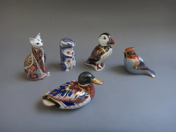 Five Royal Crown Derby Imari paperweights, each with a gold button to the base, comprising; a puffin, a mallard duck, a seated cat, a chipmunk and a c