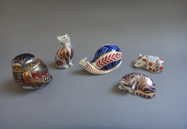 Five Royal Crown Derby Imari paperweights, each with a gold button to the base, comprising; a snail, two cats, an owl and a piglet, (5).