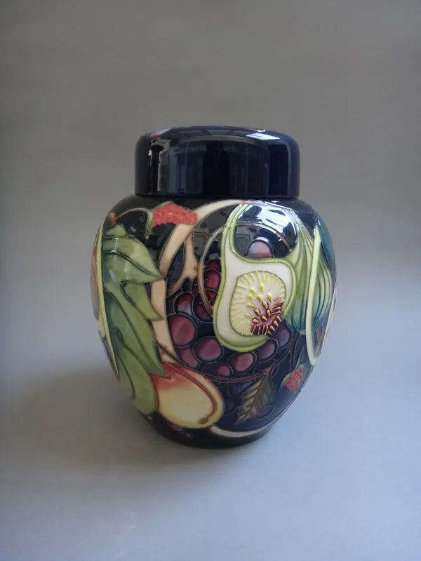 A Moorcroft 'Queen's Choice' pattern ginger jar and cover, by Emma Bossons, circa 2000, tube line decorated against a cobalt blue ground, impressed an