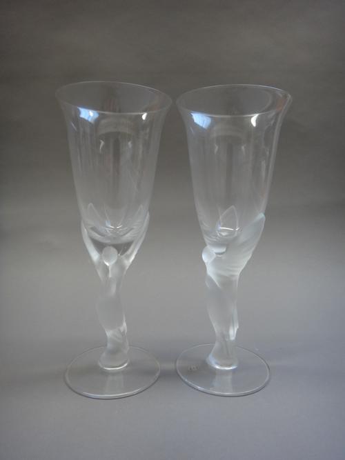 A set of twelve Faberge clear and frosted crystal champagne flutes, 25cm high, and eight matching wine glasses, 21cm high, all boxed, (20).