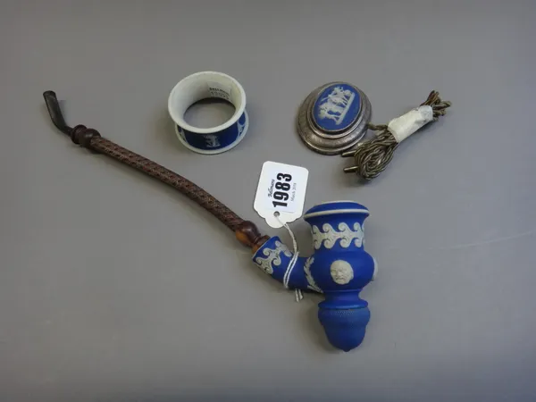 A Wedgwood blue jasper dip `Staite's Patent' pipe bowl, circa 1850, applied with three masks, impressed marks,  8.25cm. high; also a Wedgwood blue jas