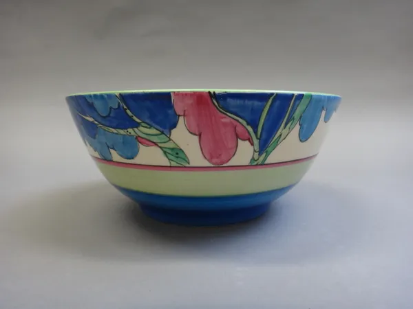 A Clarice Cliff Bizarre bowl, circa 1935, decorated in the 'Rudyard' pattern against a circular tapering ground, with black printed marks, 18.5cm diam