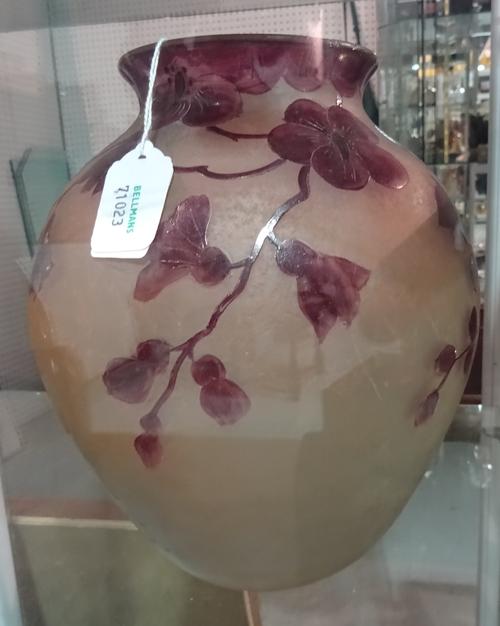 A Legras acid etched glass vase, engraved 'OVINGTON NEW YORK' to the base, purple flowers against a frosted ground (a.f), 20cm high.  C