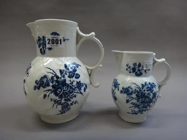 A Worcester cabbage leaf moulded blue and white mask jug, circa 1770, printed with `The Bouquet' pattern, with paper label detailed 'Gladys.L.Robertso