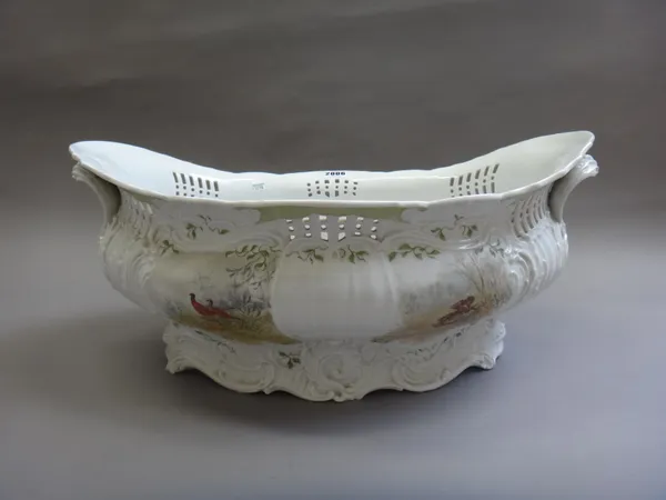 A Copenhagen porcelain two handled wine cooler, late 19th/early 20th century, decorated with game and wild fowl against a moulded oval pierced body, C