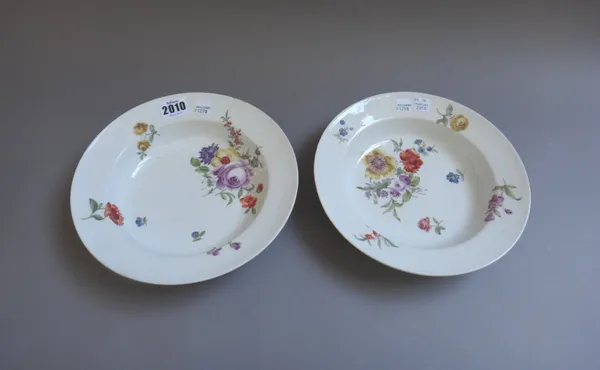 Two Meissen porcelain soup plates, circa. 1760, foliate decorated with blue crossed swords mark to the base, 22cm diameter. (2)