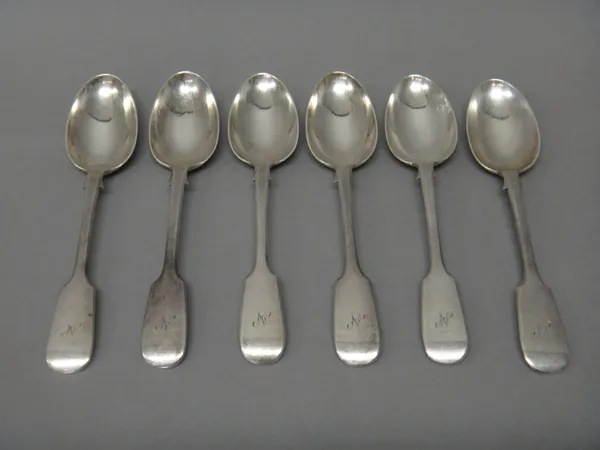 A set of six Victorian silver fiddle pattern dessert spoons, London 1885, weight 302 gs, (6).